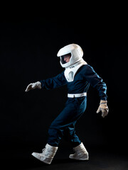 Wall Mural - An astronaut walks in low-gravity conditions. The hero