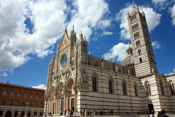 The Metropolitan Cathedral of Santa Maria Assunta or also the Duomo of Siena on a beautiful sunny day