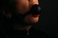 Woman With A Gag In Her Mouth. Concept Bondage Games