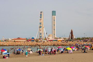 Algiers, Cityscape for The Capital Of Algeria inculding Djamaa el Djazaïr also known as the Great Mosque of Algiers and sablette amusement park with the ferris wheel