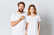 © SHOTPRIME STUDIO - man and woman stand side by side in white t-shirts Copy Space mockup design