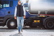 © Petro - Man driver of the lorry in a logistic company