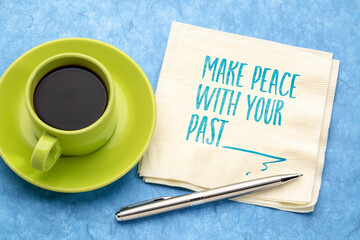 Wall Mural - make peace with your past - inspirational handwriting on a napkin with a cup of coffee, move on and personal development concept