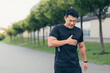 © Liubomir - Male asian athlete, has chest pain fitness in the park and running, heart aches after cardio exercise