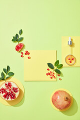 Canvas Print - Empty podium for cosmetics with pomegranate extract top view. .Glass petri dish with cosmetic products. Red pomegranate extract in Laboratory. Flatlay