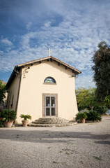 Wall Mural - View of the Sorresca church - Sabaudia lake -  Latina Italy