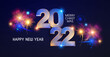 Happy new 2022 year Elegant text with light effect and fireworks.
