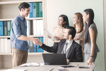 Wall Mural - Manager and his team having meeting at meeting room in office.