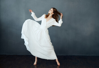 Wall Mural - woman in white dress dance posing performance glamor