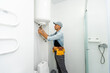 © Angelov - Plumber repairing an hot-water heater