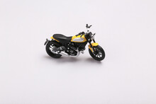Toy Motorcycle Model On Gray Background