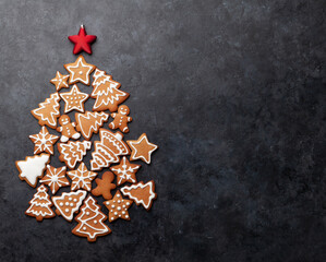 Wall Mural - Christmas card with fir tree shaped gingerbread cookies