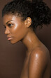 © Image Source Limited - Portrait of a young woman covered in water