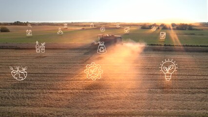 Wall Mural - ecological green energy icons concept drone shot of harvester in a cornfield sunset tracking shot