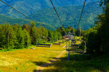 Ski Lifts Up The Mountain In Summer On A Sunny Day