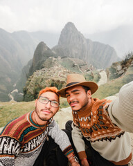 tourist couple hiking in mountains