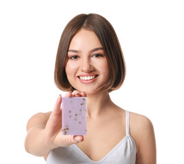 Wall Mural - Beautiful young woman with soap on white background