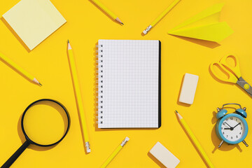 Stationery pattern. School supplies on a yellow background.