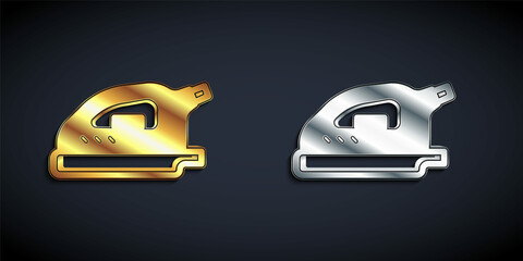 Sticker - Gold and silver Electric iron icon isolated on black background. Steam iron. Long shadow style. Vector