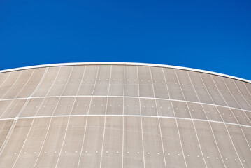 Wall Mural - Modern building detail against blue sky. Abstract architecture background