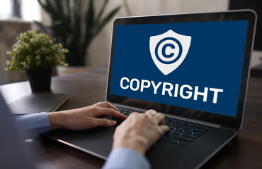 Copyright icon on screen. Patent Law and Intellectual Property. Business, Internet and Technology Concept.