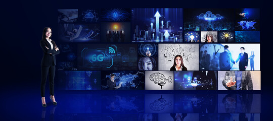 Wall Mural - Young european businesswoman looking at media picture gallery. Digital multimedia concept.