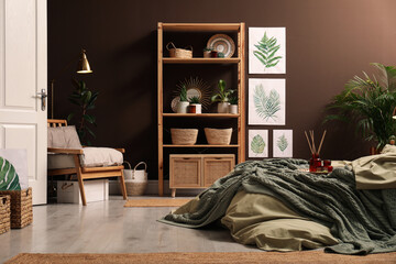 Wall Mural - Stylish interior with large comfortable bed and potted plants