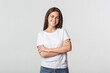 © Mix and Match Studio - Portrait of confident attractive woman, cross arms chest and smiling pleased