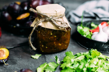 Tkemali plum sauce in a jar