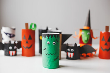 Wall Mural - Halloween monsters from toilet paper rolls. Children's crafts for Halloween.