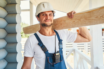 Wall Mural - Adult man with board looking into camera