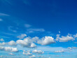 Blue sky and white clouds. Beautiful bright background.
