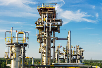 Wall Mural - View of the absorption distillation column of gas liquefaction in summer.