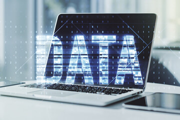Poster - Creative Data word sign on modern laptop background. Multiexposure
