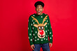 Photo of excited shocked amazed guy open mouth wow reaction wear christmas sweater isolated on red background