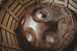 baking this musical instrument hang drum in a muffle furnace in a metal hang pan workshop