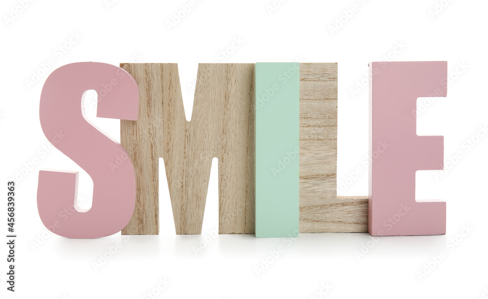Stylish decor in shape of word SMILE on white background