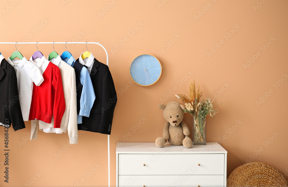 Interior of stylish room with school uniform