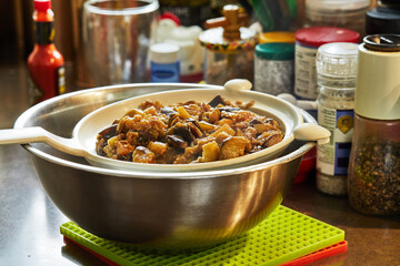 Poster - Oven-fried eggplants settle in sieve on a bowl