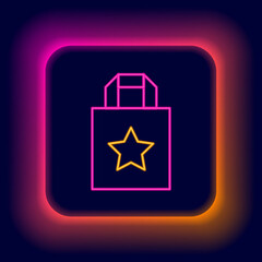 Sticker - Glowing neon line Paper shopping bag icon isolated on black background. Package sign. Colorful outline concept. Vector