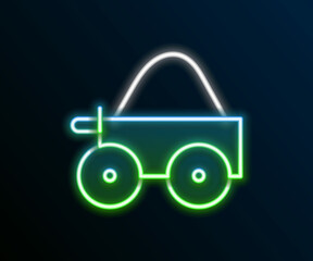 Sticker - Glowing neon line Wooden four-wheel cart with hay icon isolated on black background. Colorful outline concept. Vector