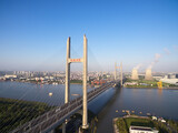 Fototapeta Miasta - Minpu Bridge over Huangpu River