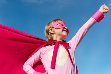 Wall Mural - Little cute girl playing superhero