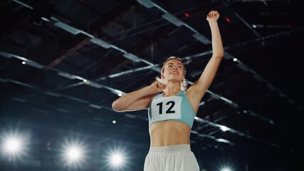 Wall Mural - Professional Female Athlete Happily Celebrating New Record on a Sport Championship. Sportswoman Raising Arms Cheering. Determination, Motivation, Inspiration Key for Success. Cinematic Medium Arc