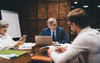 © BullRun - Group of business partners sharing business ideas