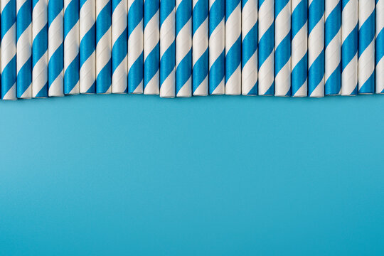 Playful trendy colors abstract background - blue striped straws