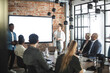 © Maskot - Female and male entrepreneurs presenting business ideas during meeting at startup company