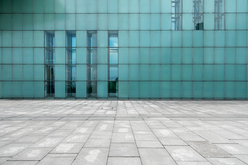 Wall Mural - The empty floor of the square and the exterior walls of modern buildings