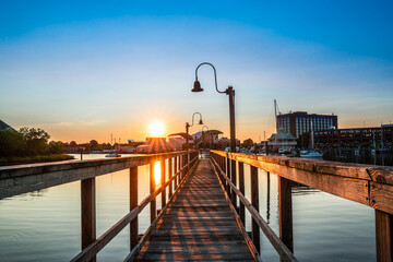 View of Hampton Virginia downtown waterfront district seen at sunset under colorful sky