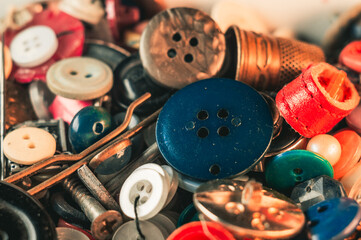 Poster - Closeup shot of sewing accessories with colorful buttons